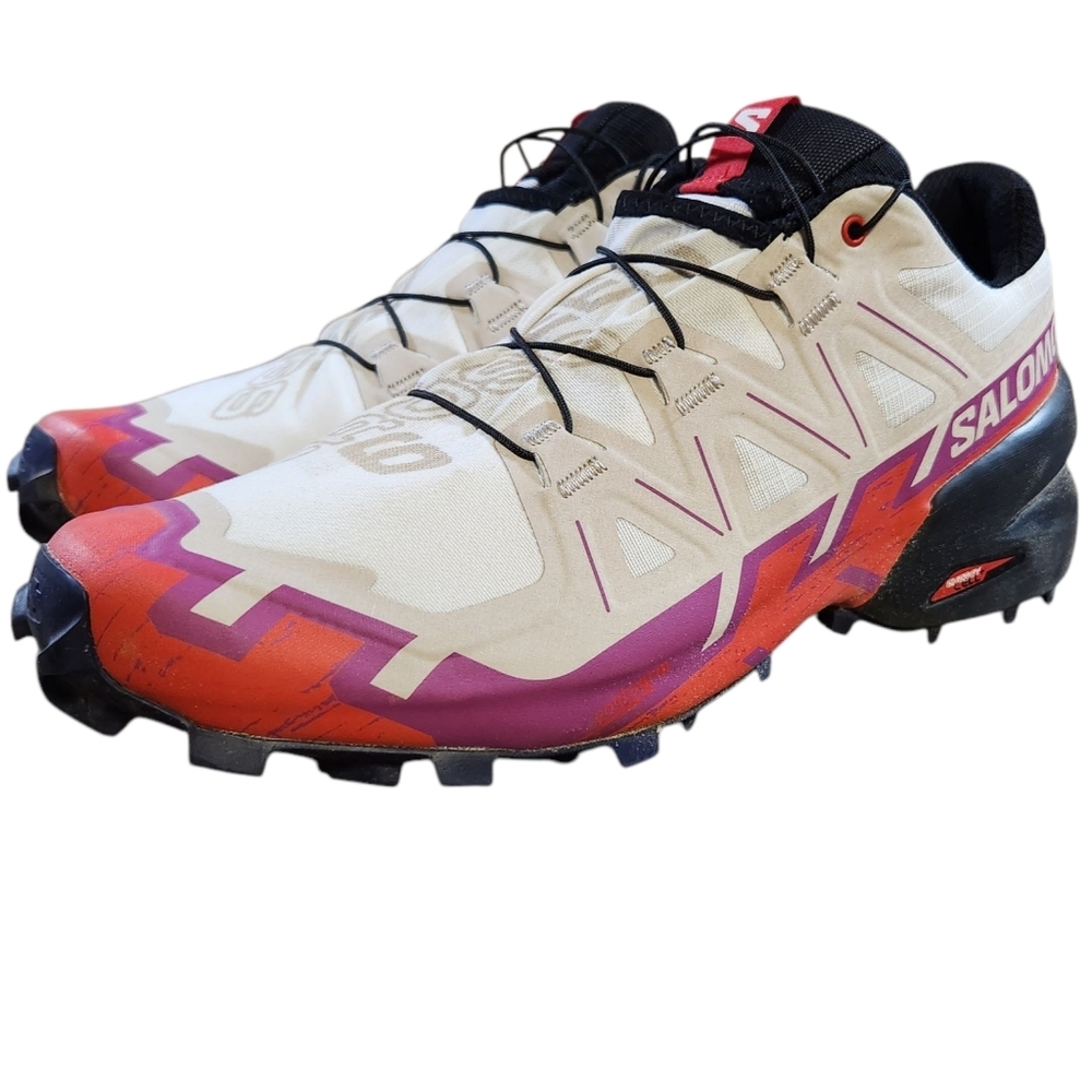 Salomon Trail Shoes in Cream, Orange, and Purple